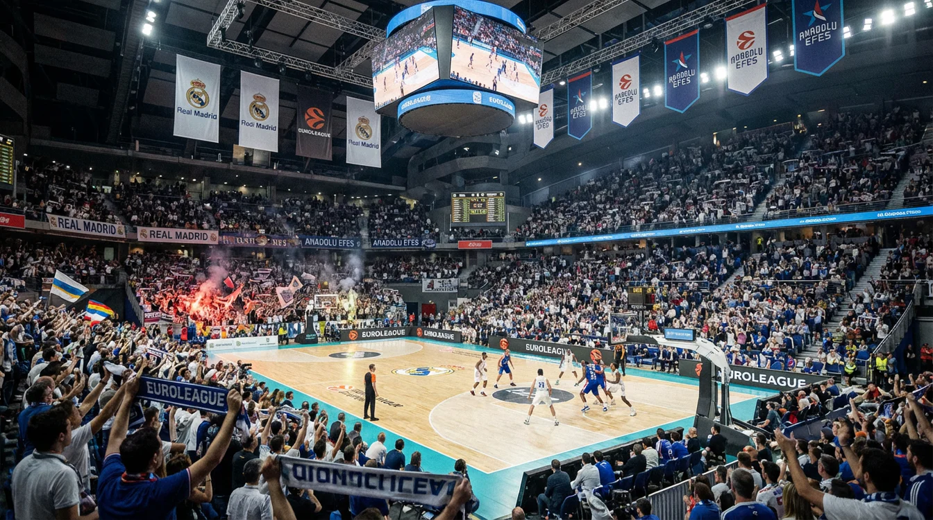 Pavilhão de basquetebol europeu com adeptos nas bancadas durante um jogo